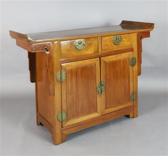 A Chinese padouk wood cabinet W.124cm